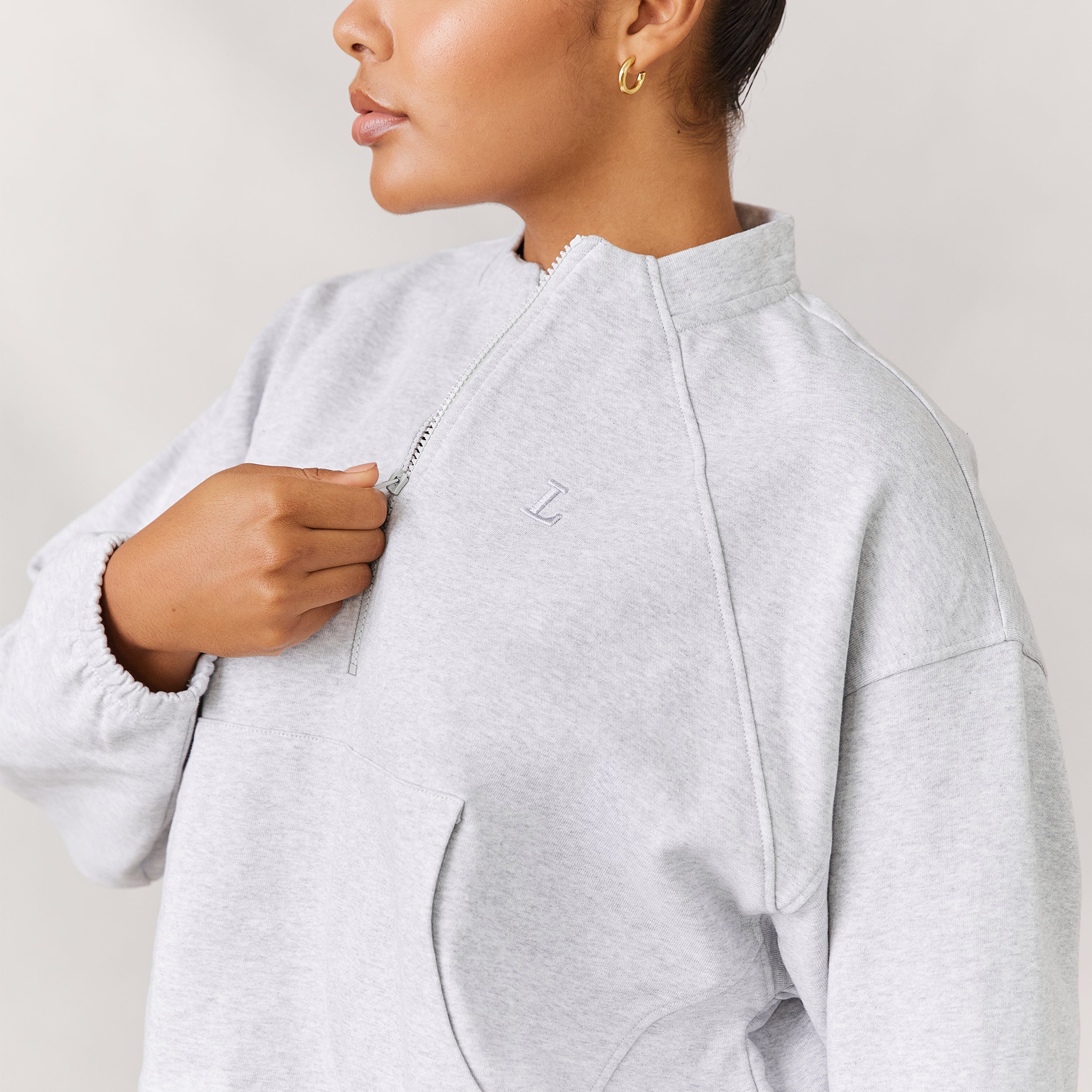 Varsity Pull avec Quart de Zip | Amber, M