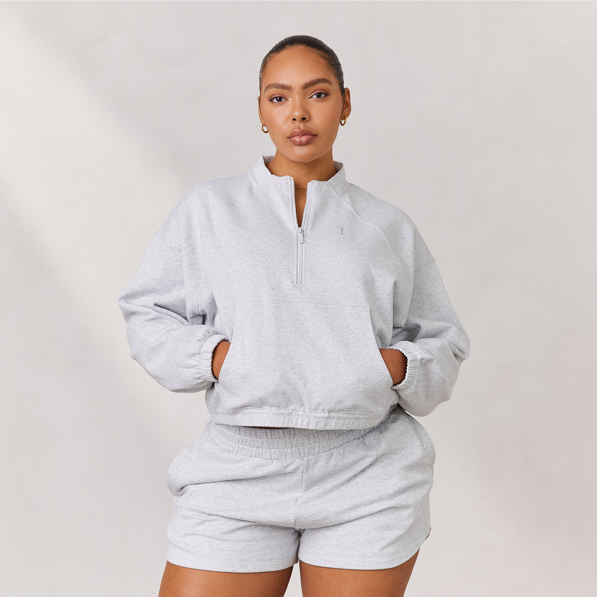 Varsity Pull avec Quart de Zip | Amber, M